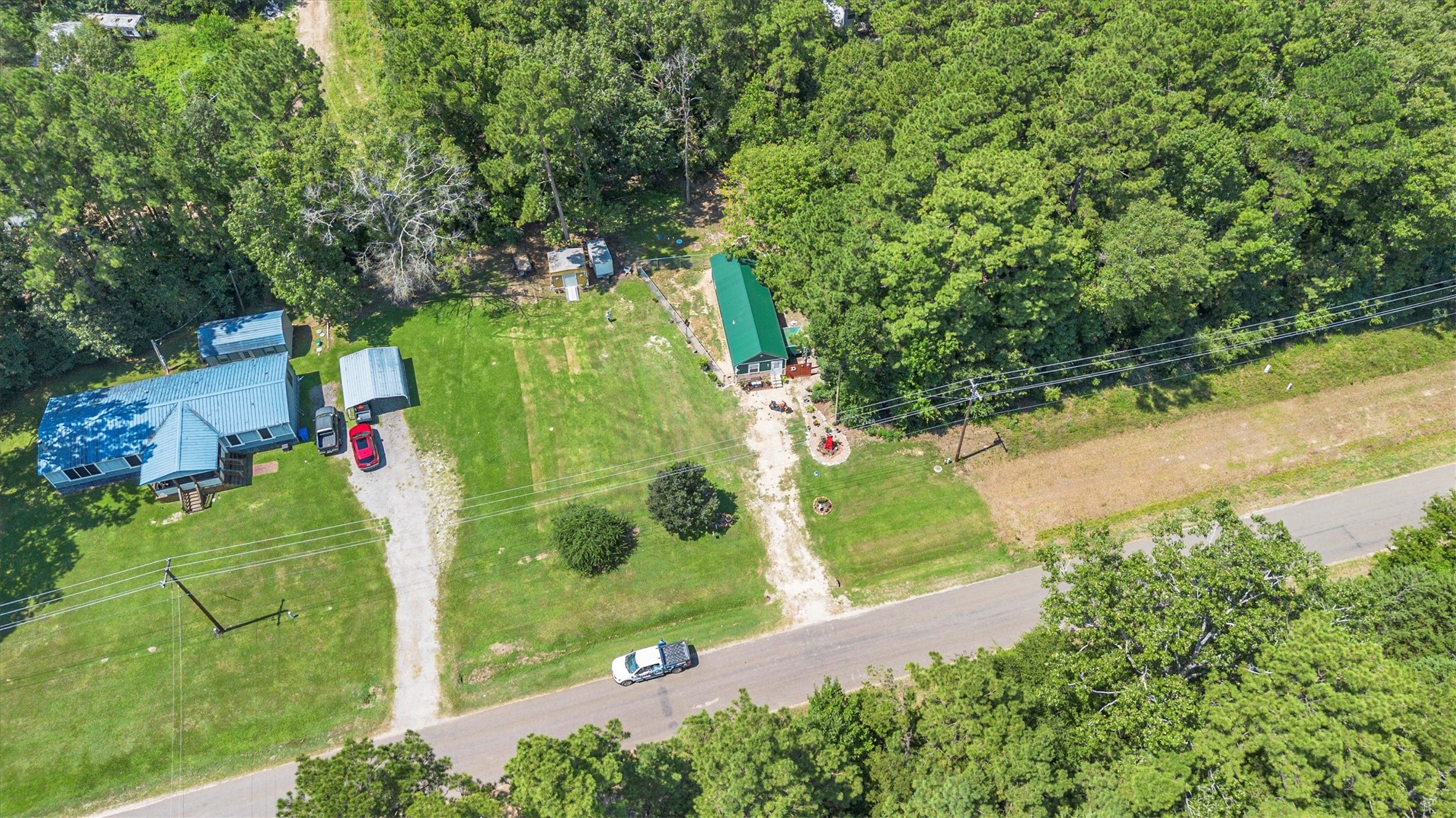 2075 Mangum Road Livingston, TX 77351 - Photo 37 of 45 a view of a tennis court
