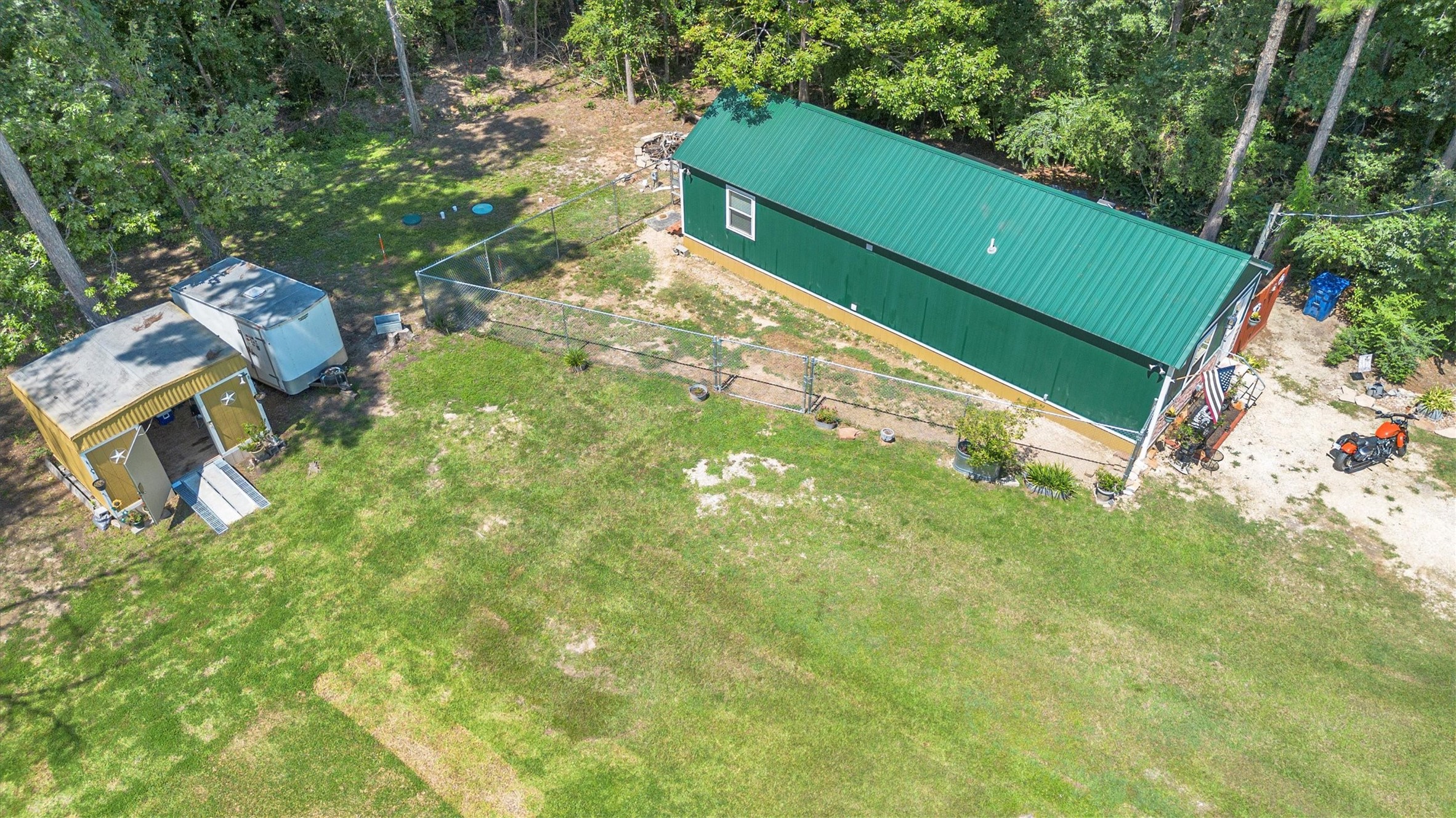 2075 Mangum Road Livingston, TX 77351 - Photo 40 of 45 a green field with lots of tress in it