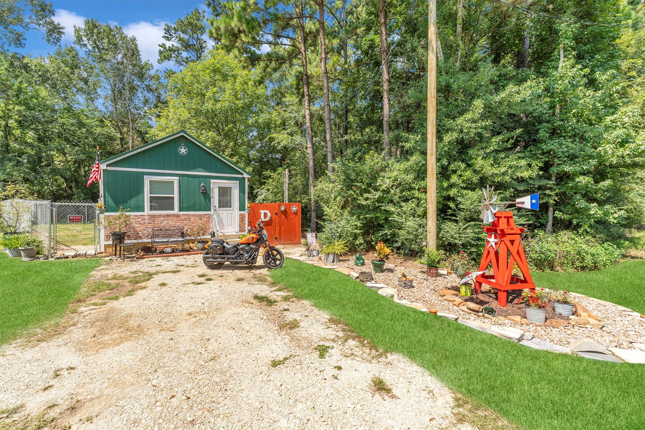 2075 Mangum Road Livingston, TX 77351 - Photo 4 of 45 a view of a house with backyard and trees