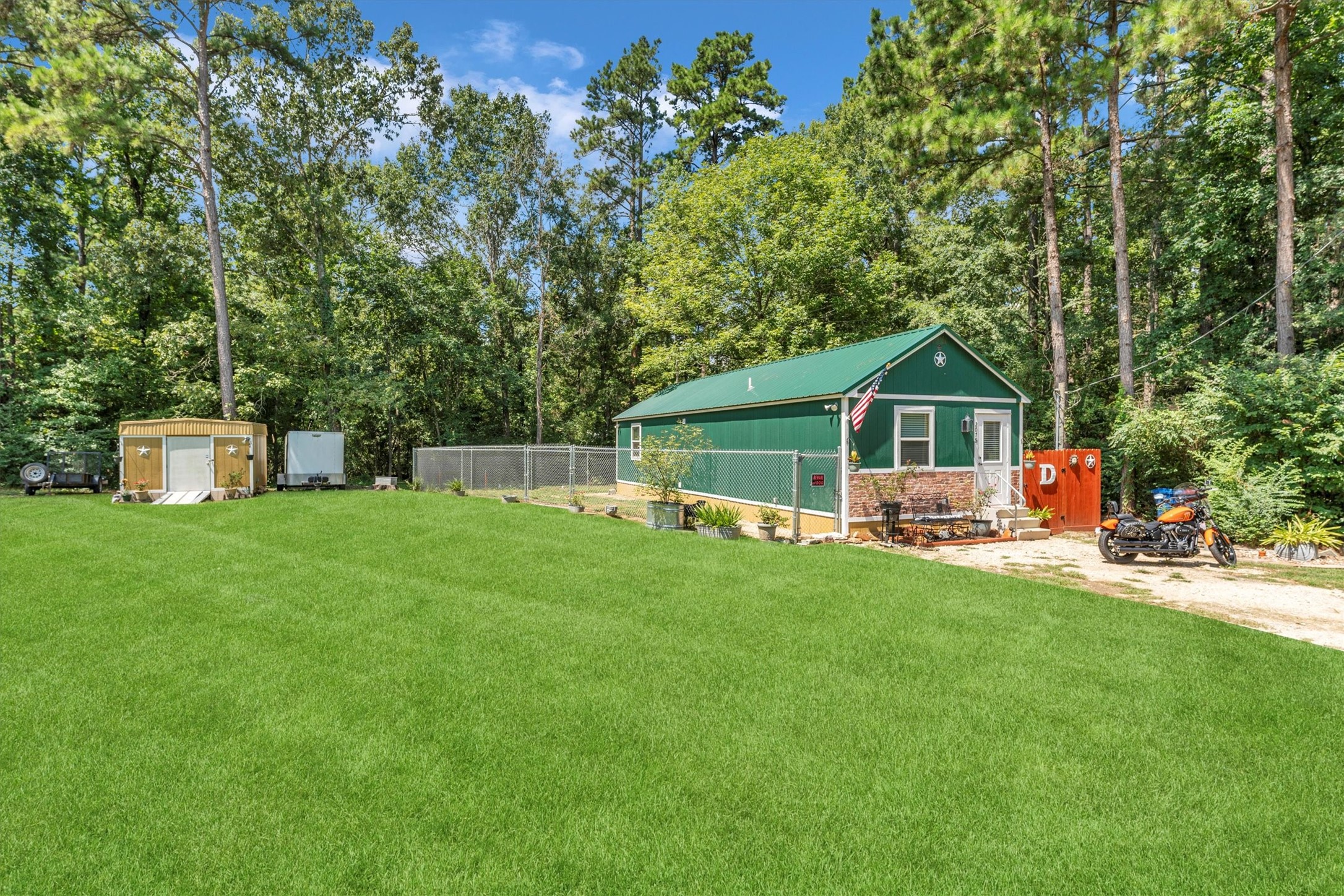 2075 Mangum Road Livingston, TX 77351 - Photo 5 of 45 a front view of house with yard and green space