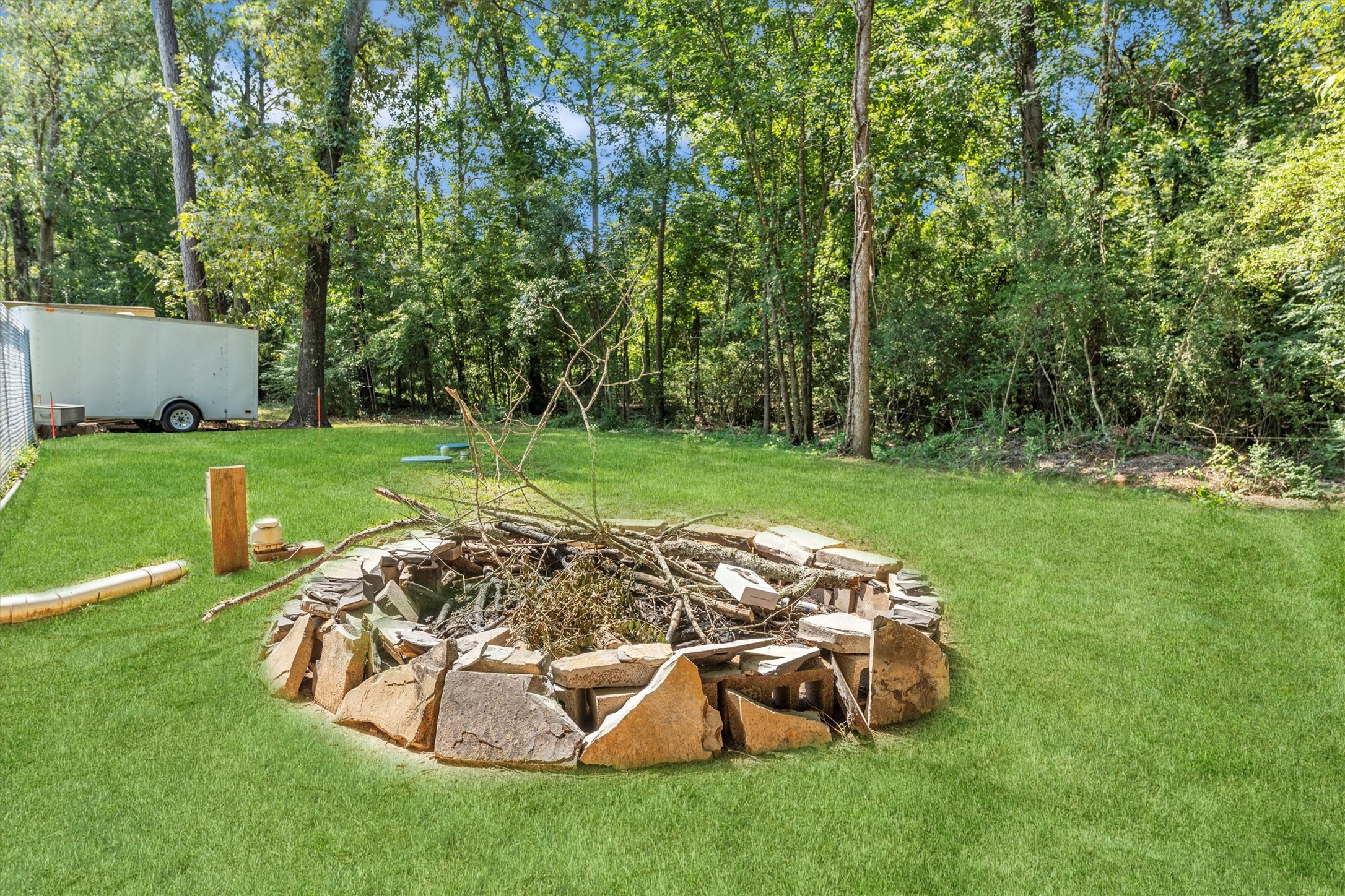 2075 Mangum Road Livingston, TX 77351 - Photo 6 of 45 a view of a wooden deck and a yard