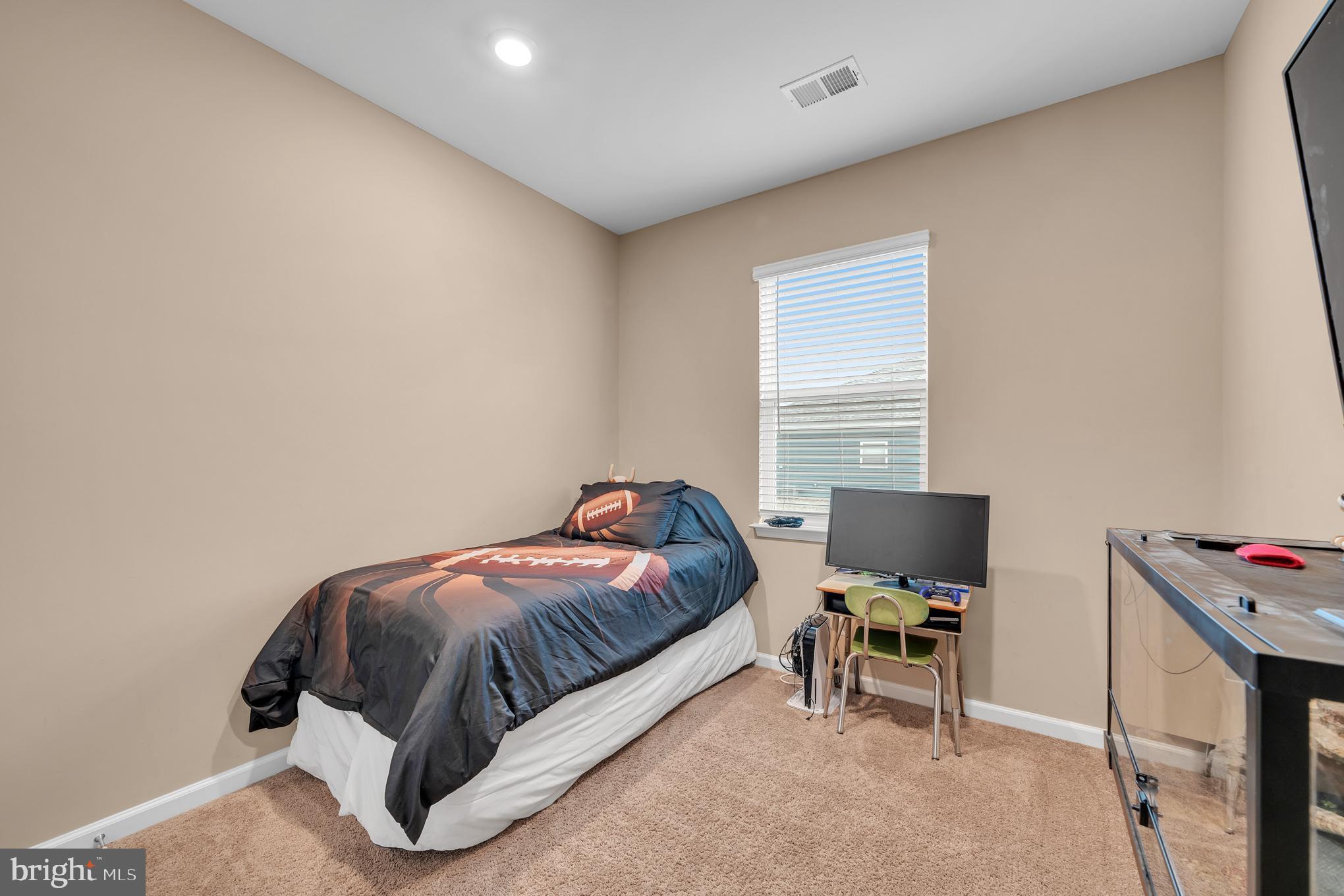 17 Ledger Drive Hanover, PA 17331 - Photo 17 of 23 a bedroom with a bed and chair