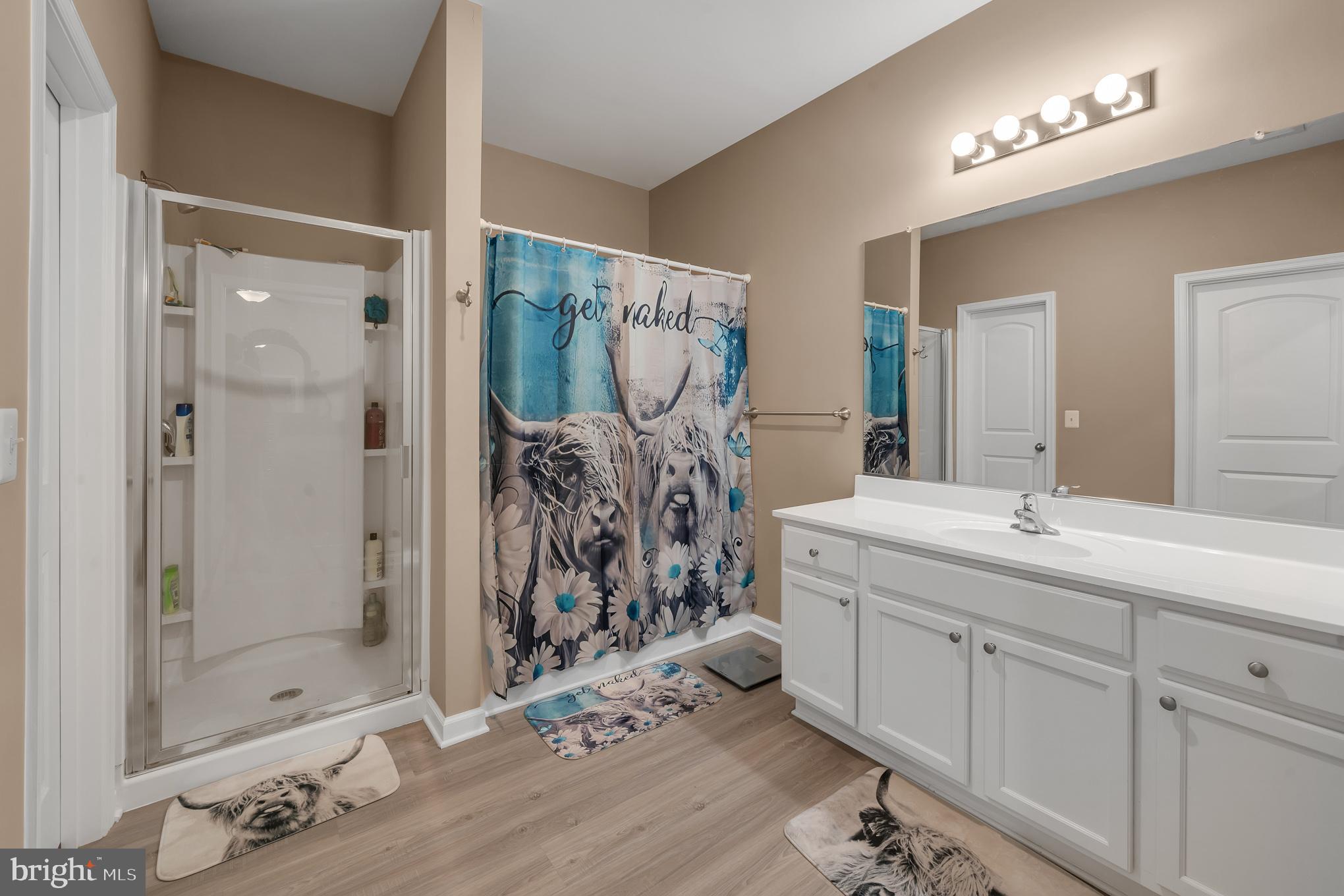 17 Ledger Drive Hanover, PA 17331 - Photo 18 of 23 a bathroom with a double vanity sink mirror and shower