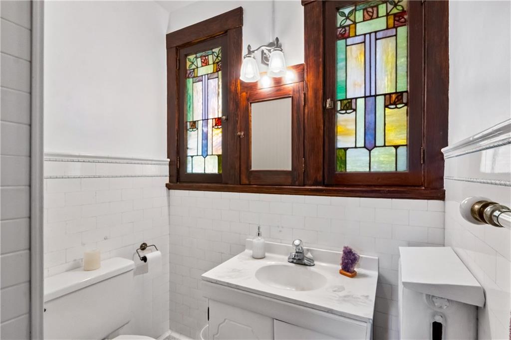 47 Ralston Place Mt. Lebanon, PA 15216 - Photo 27 of 44 Bathroom with original character and stained glass accent