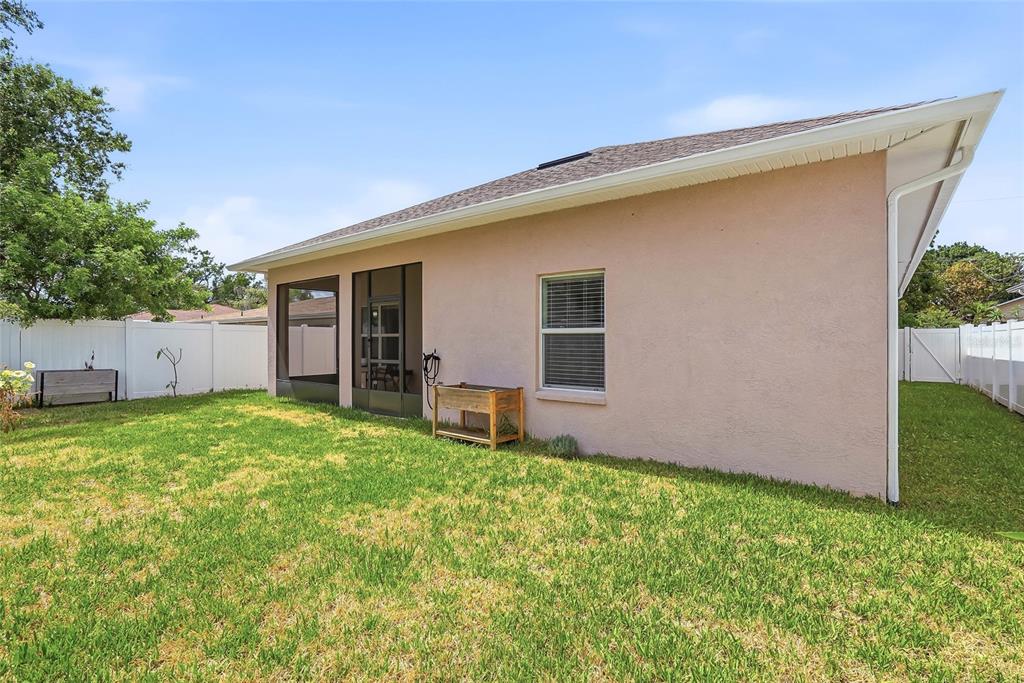 2906 West Douglas Street Tampa, FL 33607 - Photo 29 of 36 a front view of house with yard and seating area