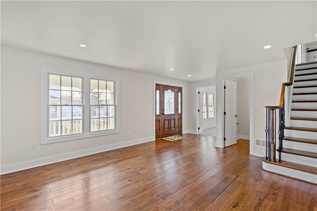 411 Georgetown Road Lawrence, PA 15055 - Photo 13 of 40 wooden floor in an empty room with a window