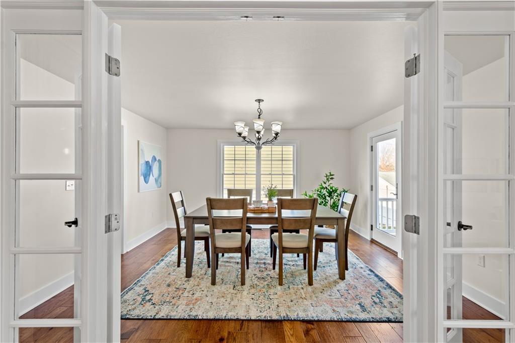 411 Georgetown Road Lawrence, PA 15055 - Photo 22 of 40 a view of a dining room with furniture and window