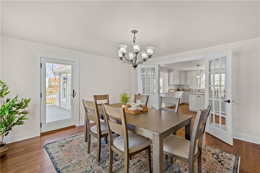 411 Georgetown Road Lawrence, PA 15055 - Photo 23 of 40 a view of a dining room with furniture and wooden floor