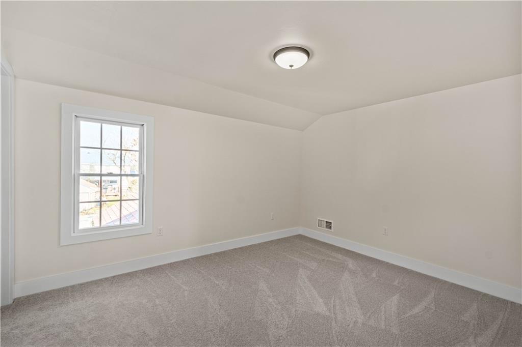 411 Georgetown Road Lawrence, PA 15055 - Photo 30 of 40 an empty room with a window