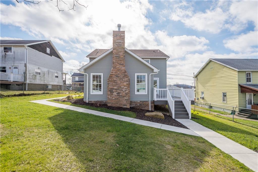411 Georgetown Road Lawrence, PA 15055 - Photo 8 of 40 a view of a house with a swimming pool