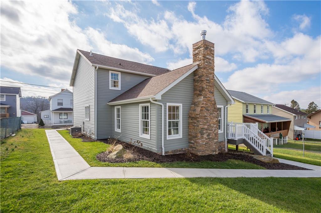 411 Georgetown Road Lawrence, PA 15055 - Photo 9 of 40 a view of a house with a yard