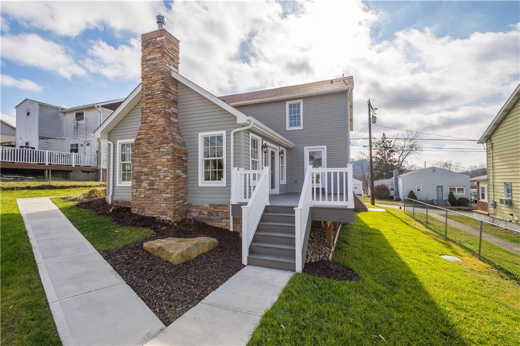 411 Georgetown Road Lawrence, PA 15055 - Photo 10 of 40 a view of a house with a swimming pool