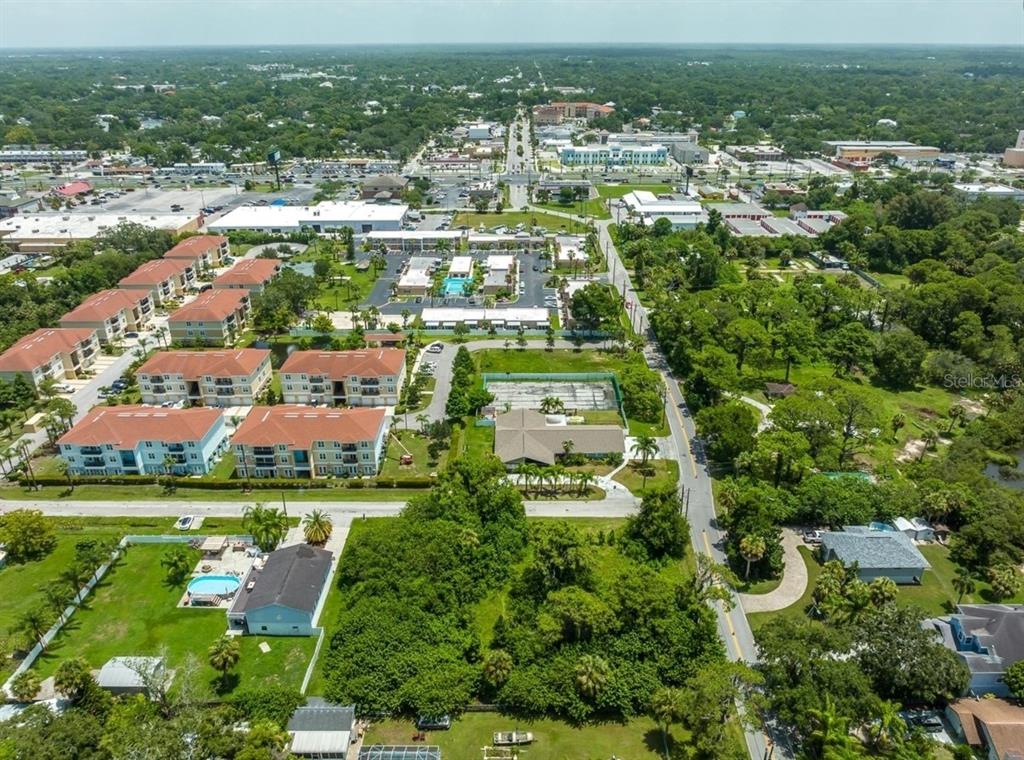 6307 Oelsner Street, Unit 11&12 New Port Richey, FL 34652 - Photo 6 of 11 an aerial view of residential houses with outdoor space