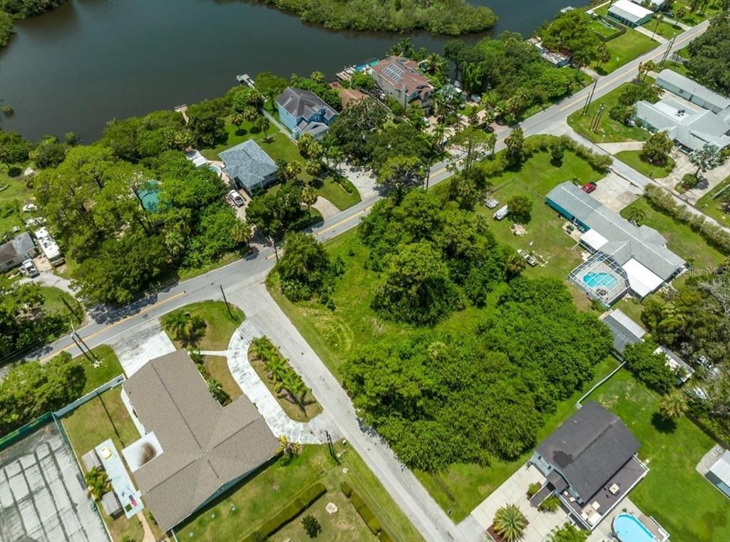 6307 Oelsner Street, Unit 11&12 New Port Richey, FL 34652 - Photo 9 of 11 an aerial view of a house with a yard
