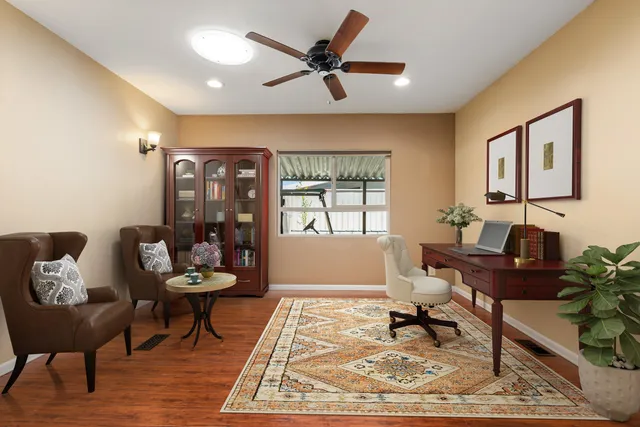 a living room with furniture and a window