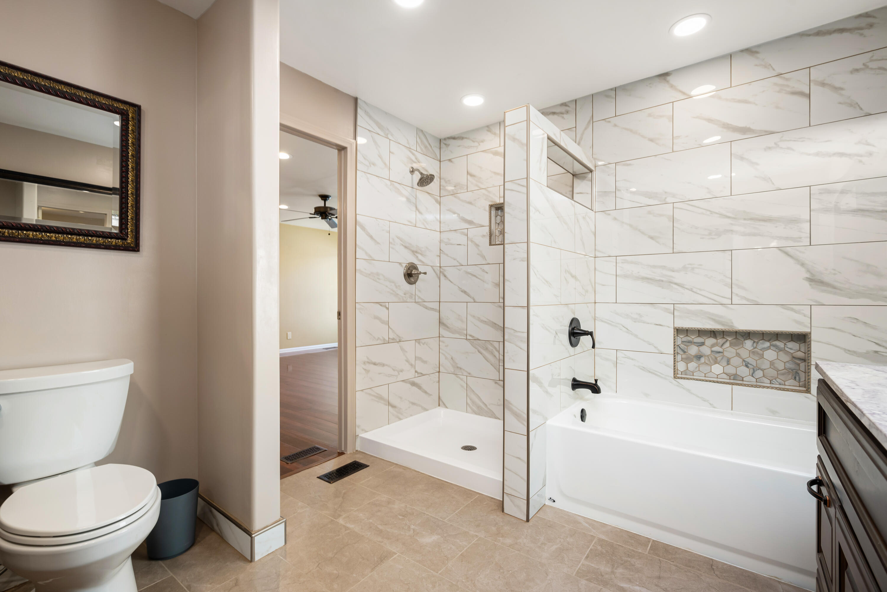 74096 Angels Cp Road Palm Desert, CA 92260 - Photo 16 of 33 a bathroom with a shower a toilet and a bathtub