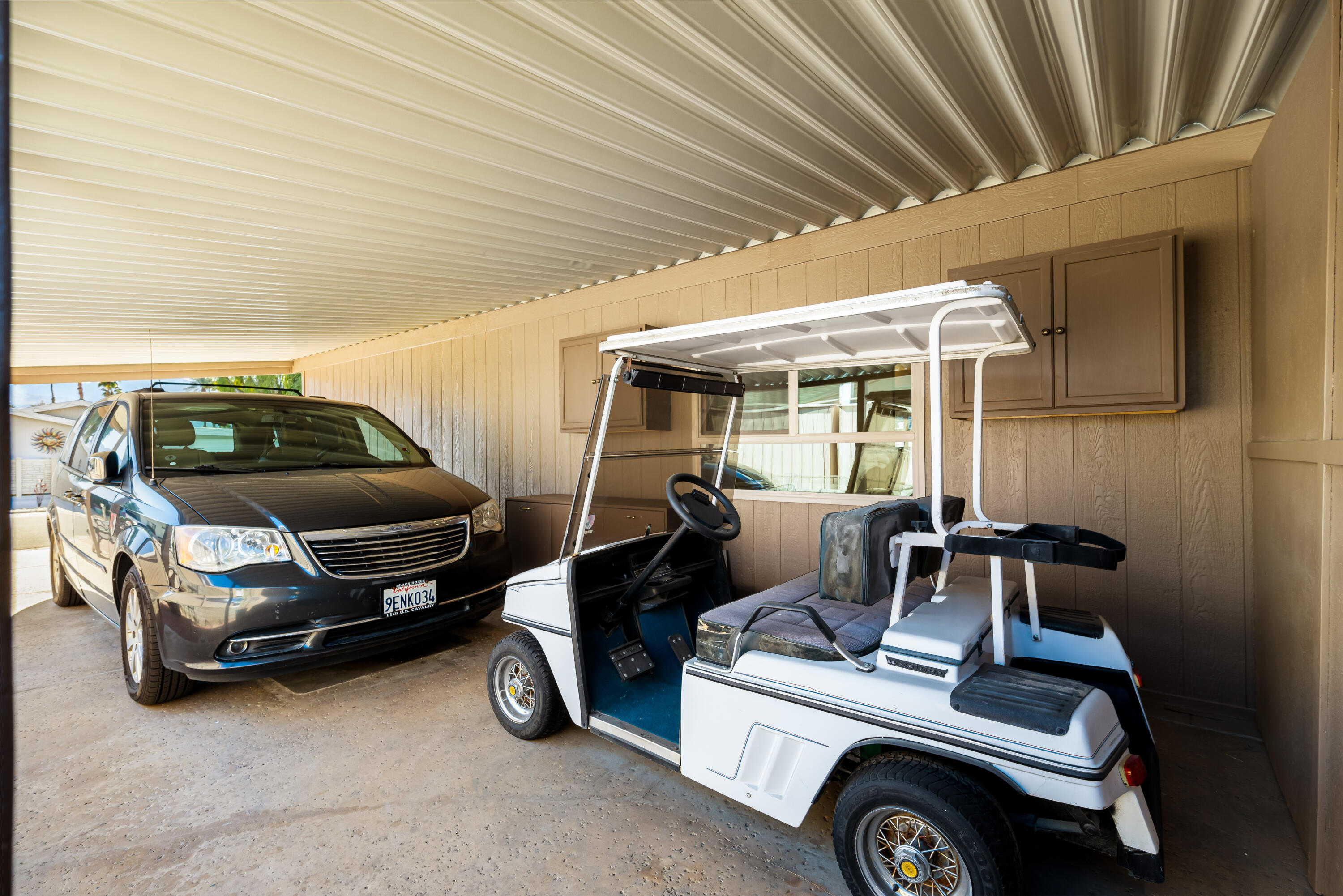 74096 Angels Cp Road Palm Desert, CA 92260 - Photo 23 of 33 a car parked in garage