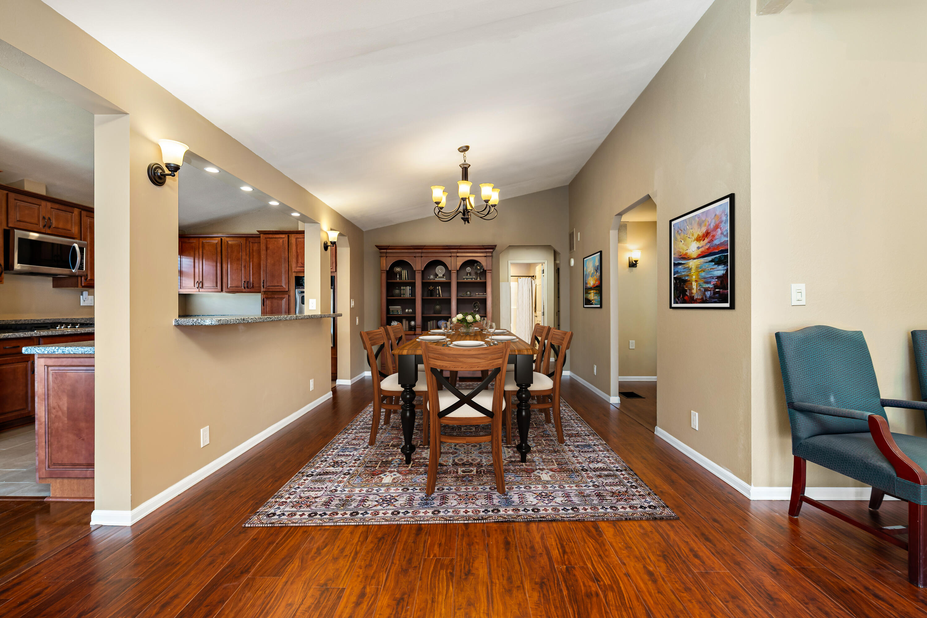 74096 Angels Cp Road Palm Desert, CA 92260 - Photo 4 of 33 a view of a dining room with furniture window and wooden floor