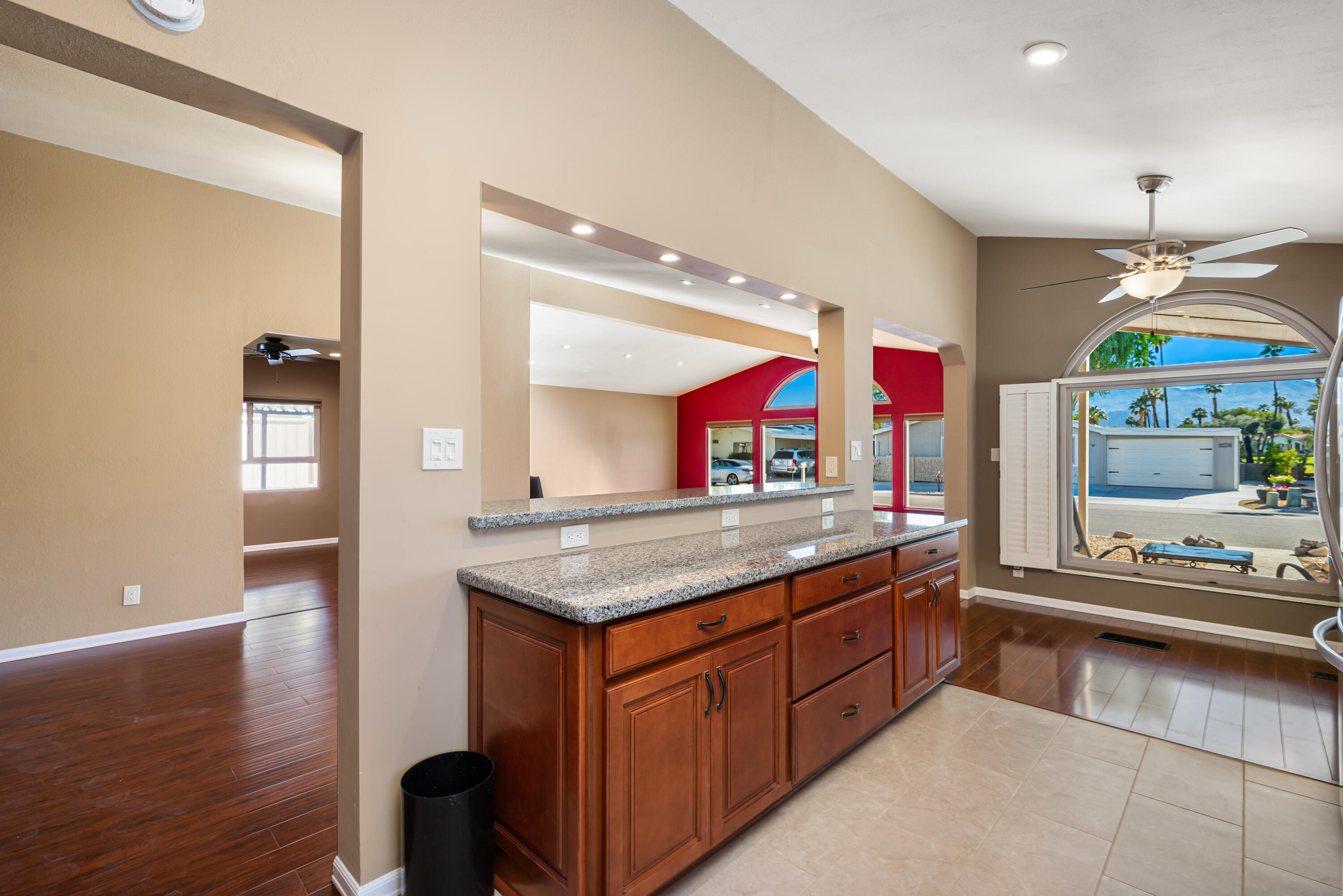 74096 Angels Cp Road Palm Desert, CA 92260 - Photo 9 of 33 a kitchen with stainless steel appliances granite countertop a sink and a stove