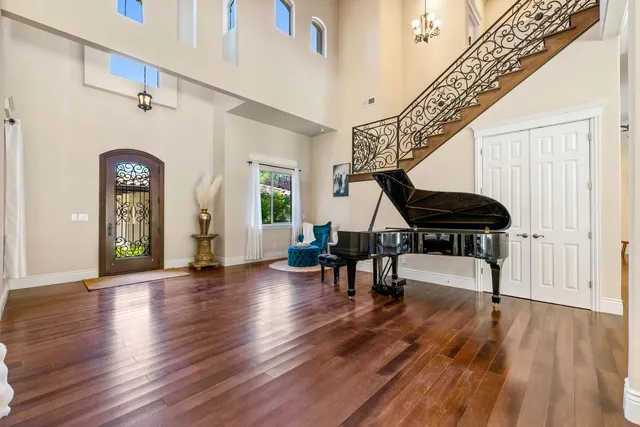 a view of a livingroom with furniture and hardwood floor