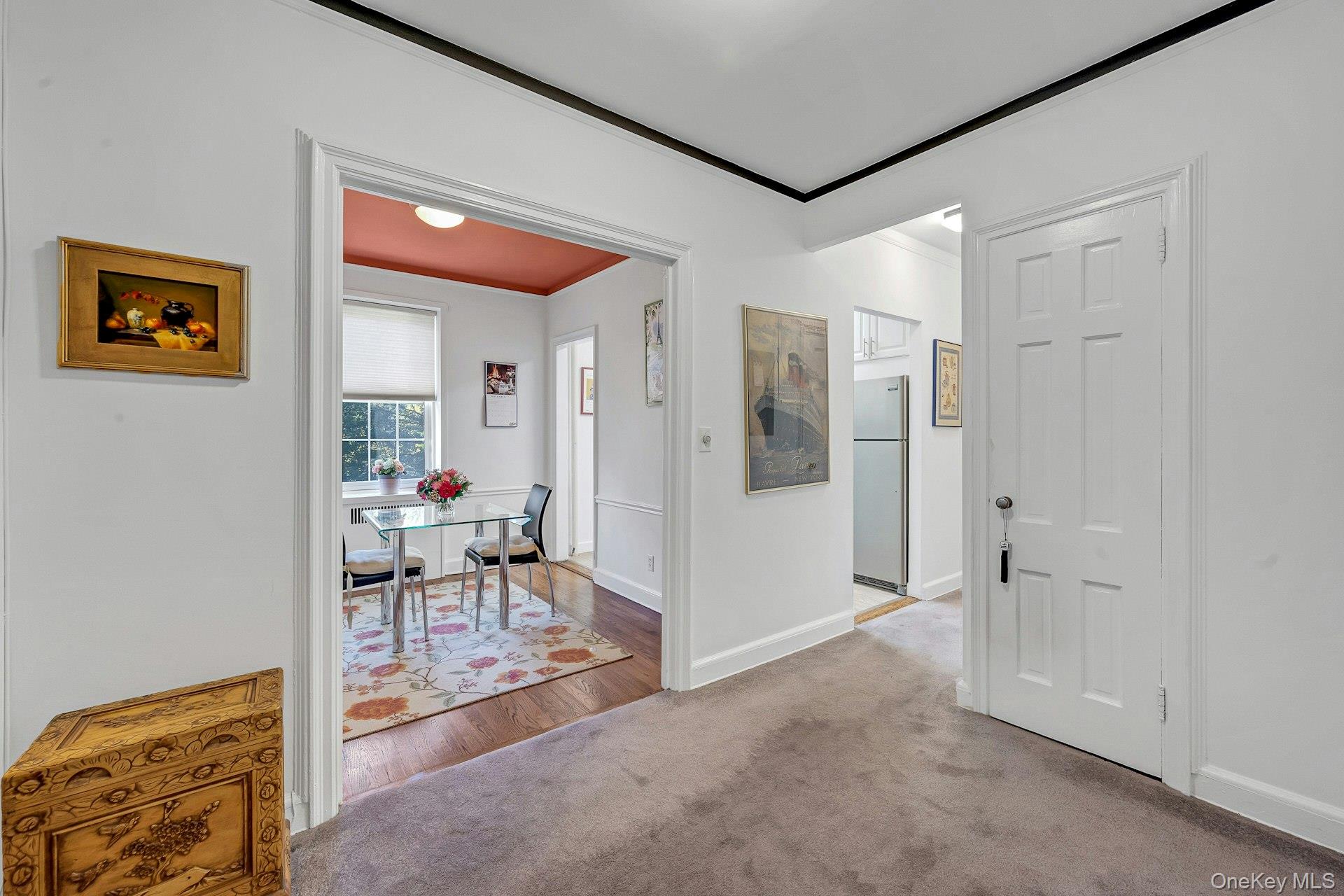 3 Midland Gardens, Unit 3H Bronxville, NY 10708 - Photo 5 of 20 a view of a hallway with bathroom view and a living room