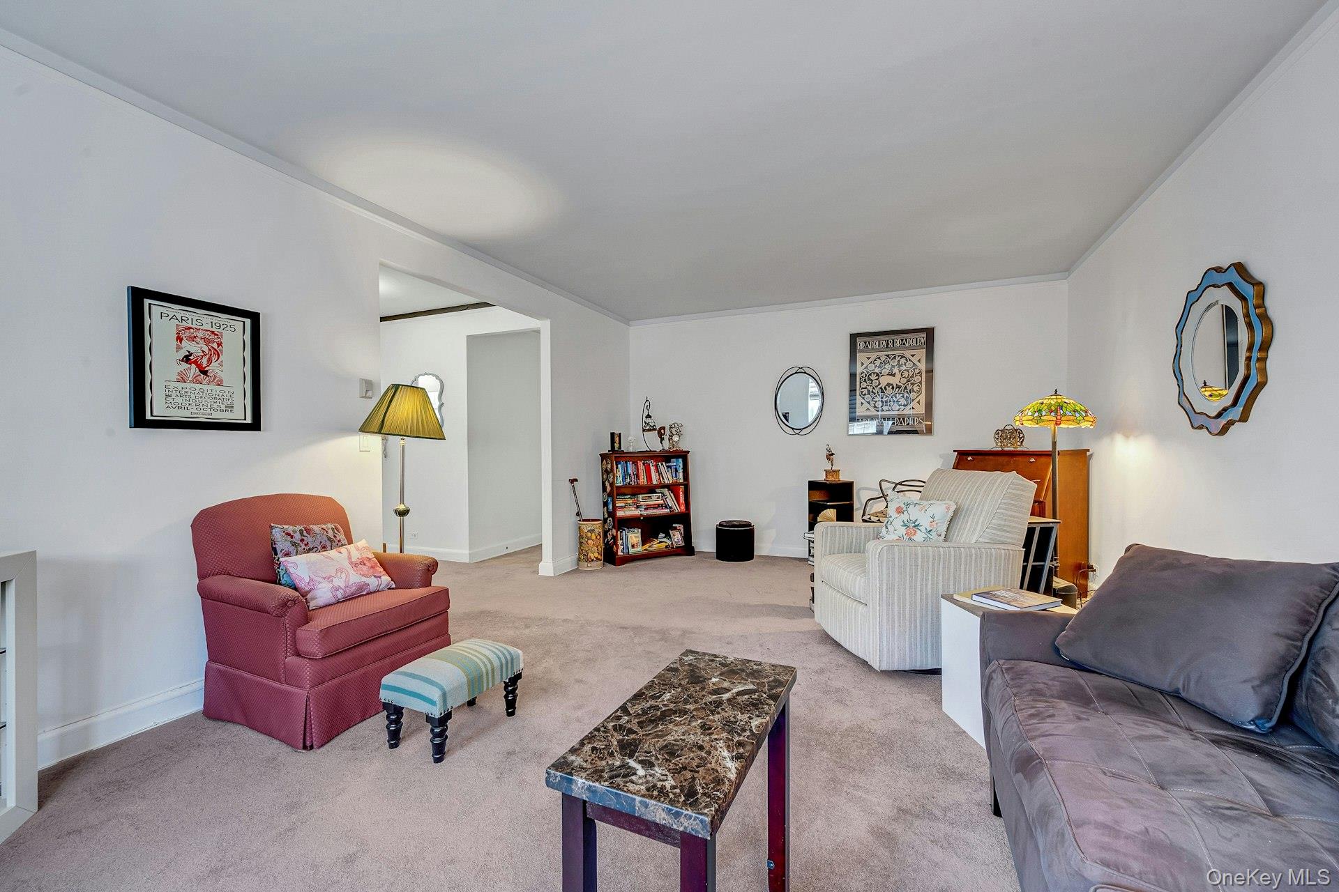 3 Midland Gardens, Unit 3H Bronxville, NY 10708 - Photo 8 of 20 a living room with furniture and a table