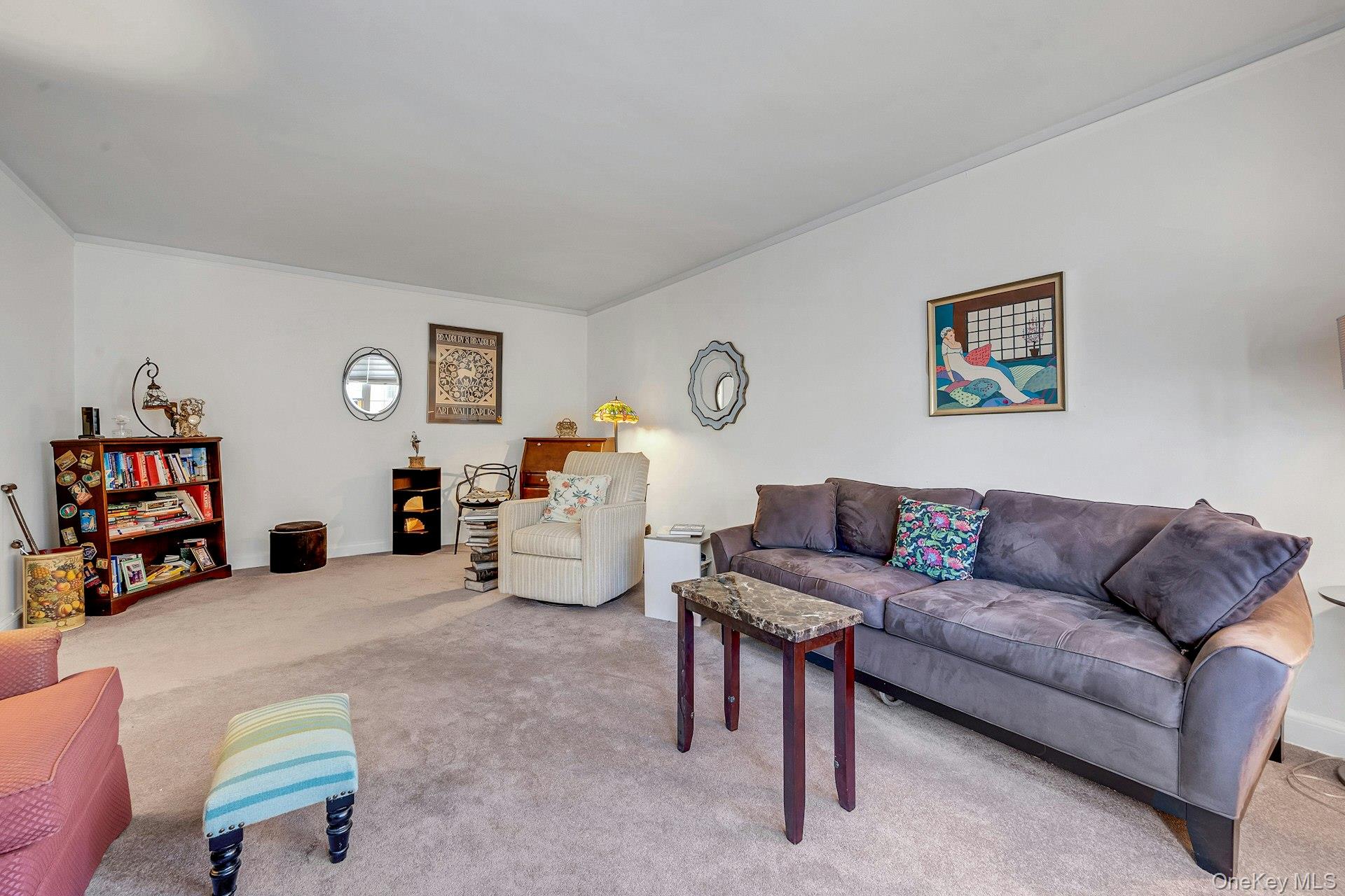 3 Midland Gardens, Unit 3H Bronxville, NY 10708 - Photo 9 of 20 a living room with furniture and a couch