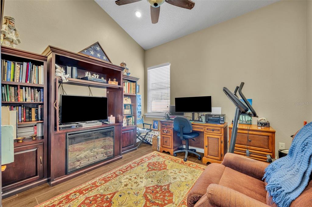 1134 Kelso Boulevard Windermere, FL 34786 - Photo 16 of 37 a living room with furniture and a flat screen tv