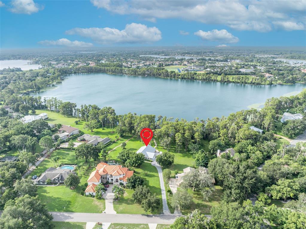 1134 Kelso Boulevard Windermere, FL 34786 - Photo 31 of 37 an aerial view of residential building with outdoor space and lake view