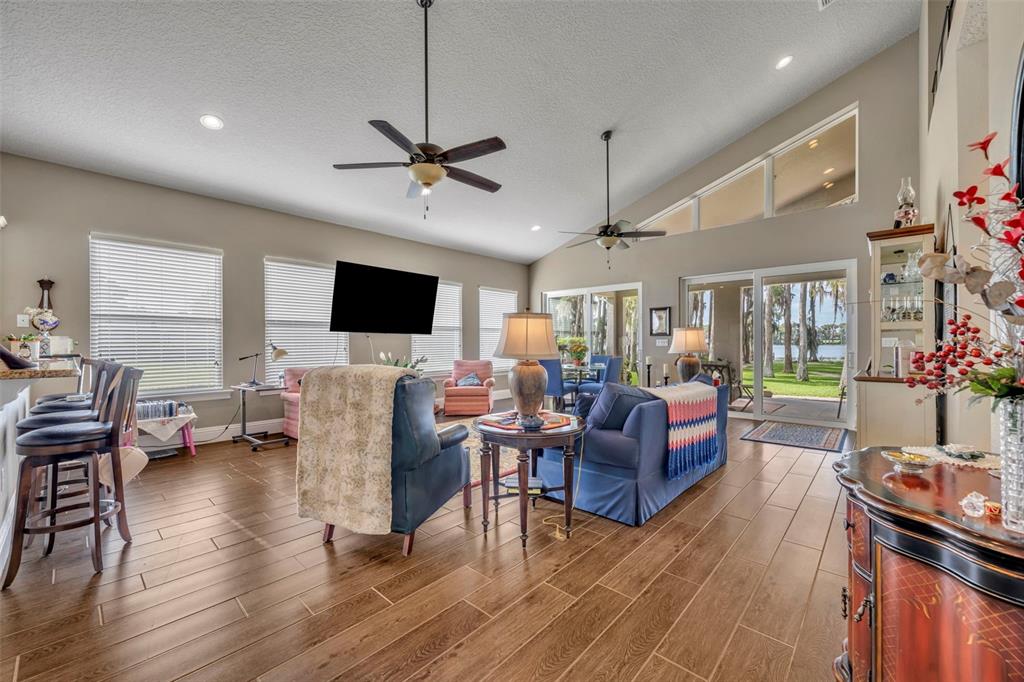 1134 Kelso Boulevard Windermere, FL 34786 - Photo 8 of 37 a living room with furniture and a flat screen tv