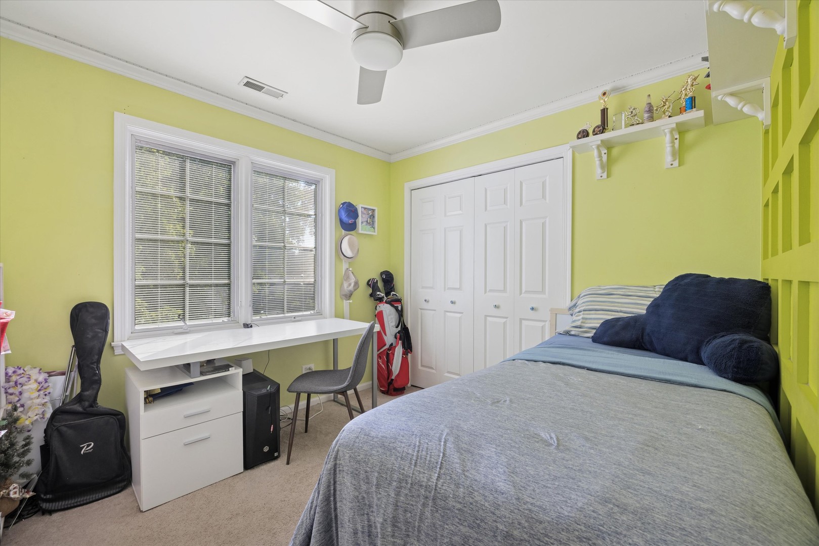 1115 North Main Street Wheaton, IL 60187 - Photo 16 of 28 a bedroom with a bed and a table