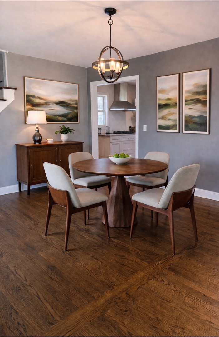 1115 North Main Street Wheaton, IL 60187 - Photo 8 of 28 a view of a dining room with furniture window and wooden floor