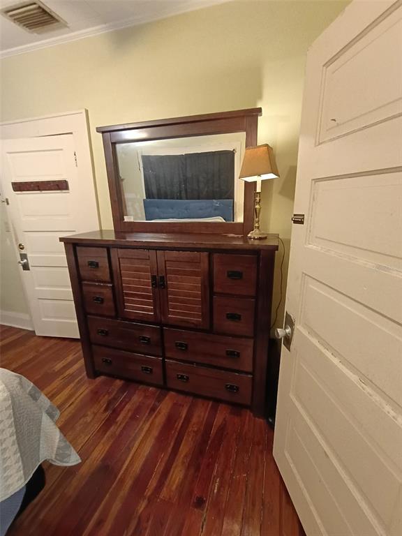 513 West Main Street Wauchula, FL 33873 - Photo 43 of 43 a view of walk in closet with wooden floor