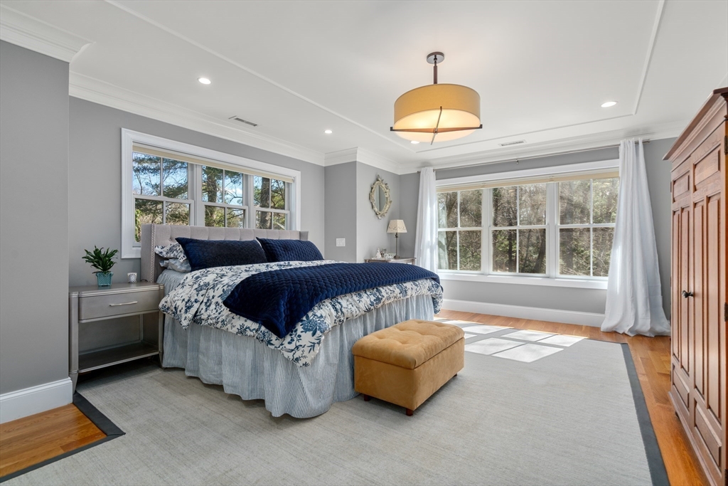 20 Manor Avenue Wellesley, MA 02482 - Photo 16 of 32 a spacious bedroom with a bed and a window