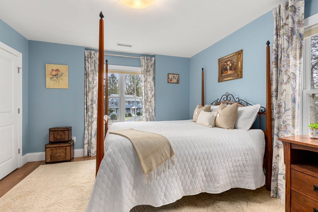 20 Manor Avenue Wellesley, MA 02482 - Photo 21 of 32 a bedroom with a bed lamp and a window