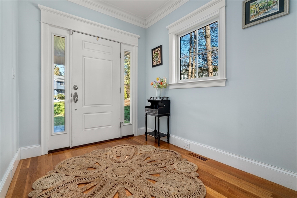20 Manor Avenue Wellesley, MA 02482 - Photo 26 of 32 a view of a bedroom with wooden floor and bathroom