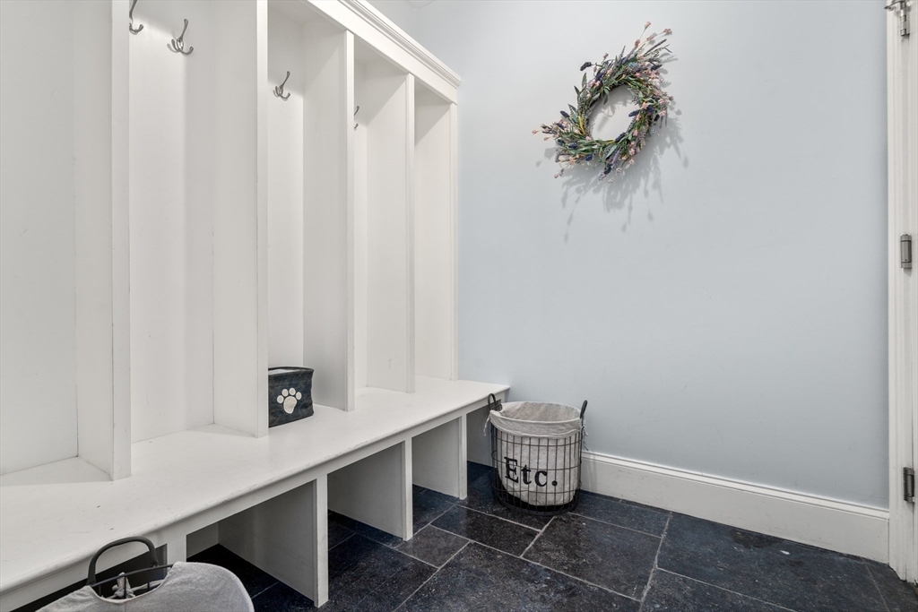 20 Manor Avenue Wellesley, MA 02482 - Photo 27 of 32 a room with a table and a chair