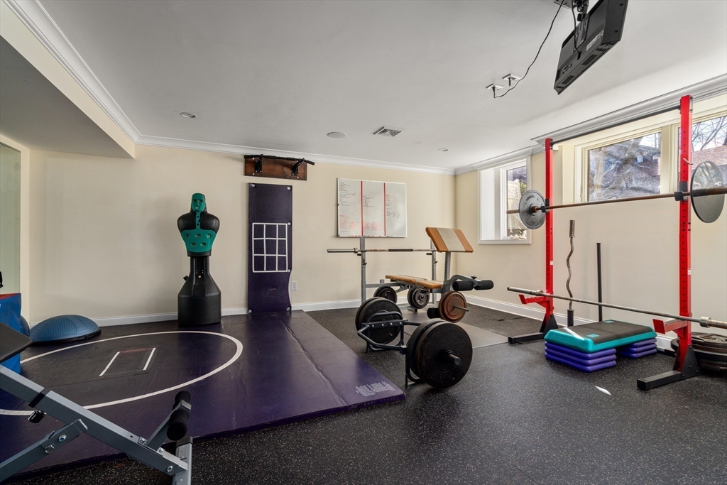 20 Manor Avenue Wellesley, MA 02482 - Photo 29 of 32 a room with gym equipment and a large window