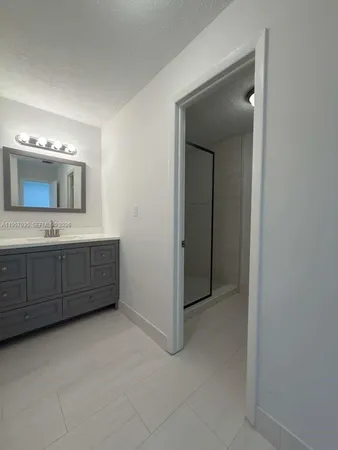 a bathroom with a toilet sink and a bathtub