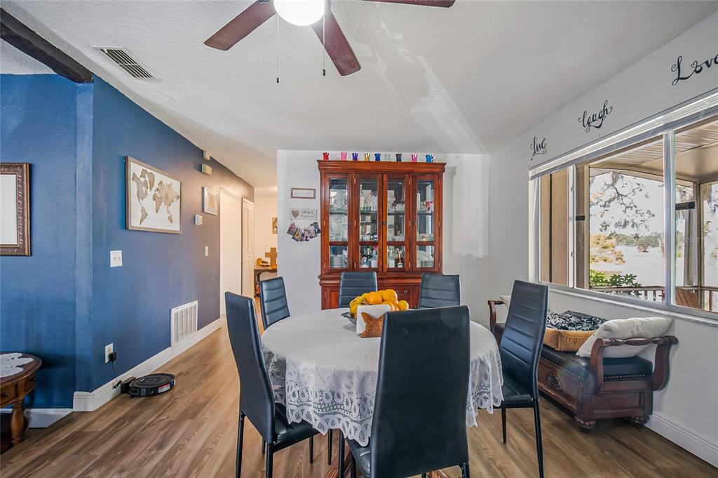 4432 Watch Hill Road Orlando, FL 32808 - Photo 10 of 30 a living room with furniture and a large window