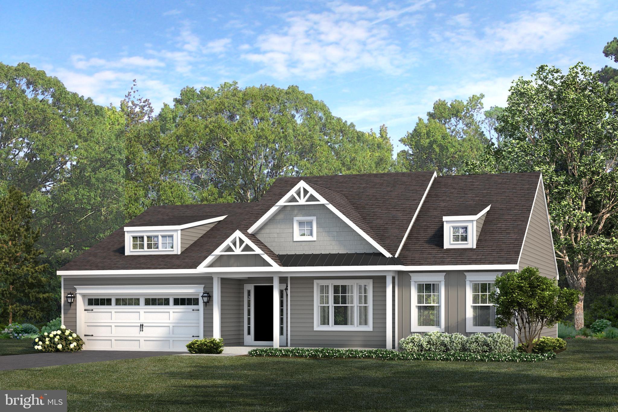 front view of a house with a garden