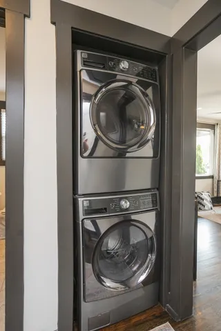 a utility room with washing machine