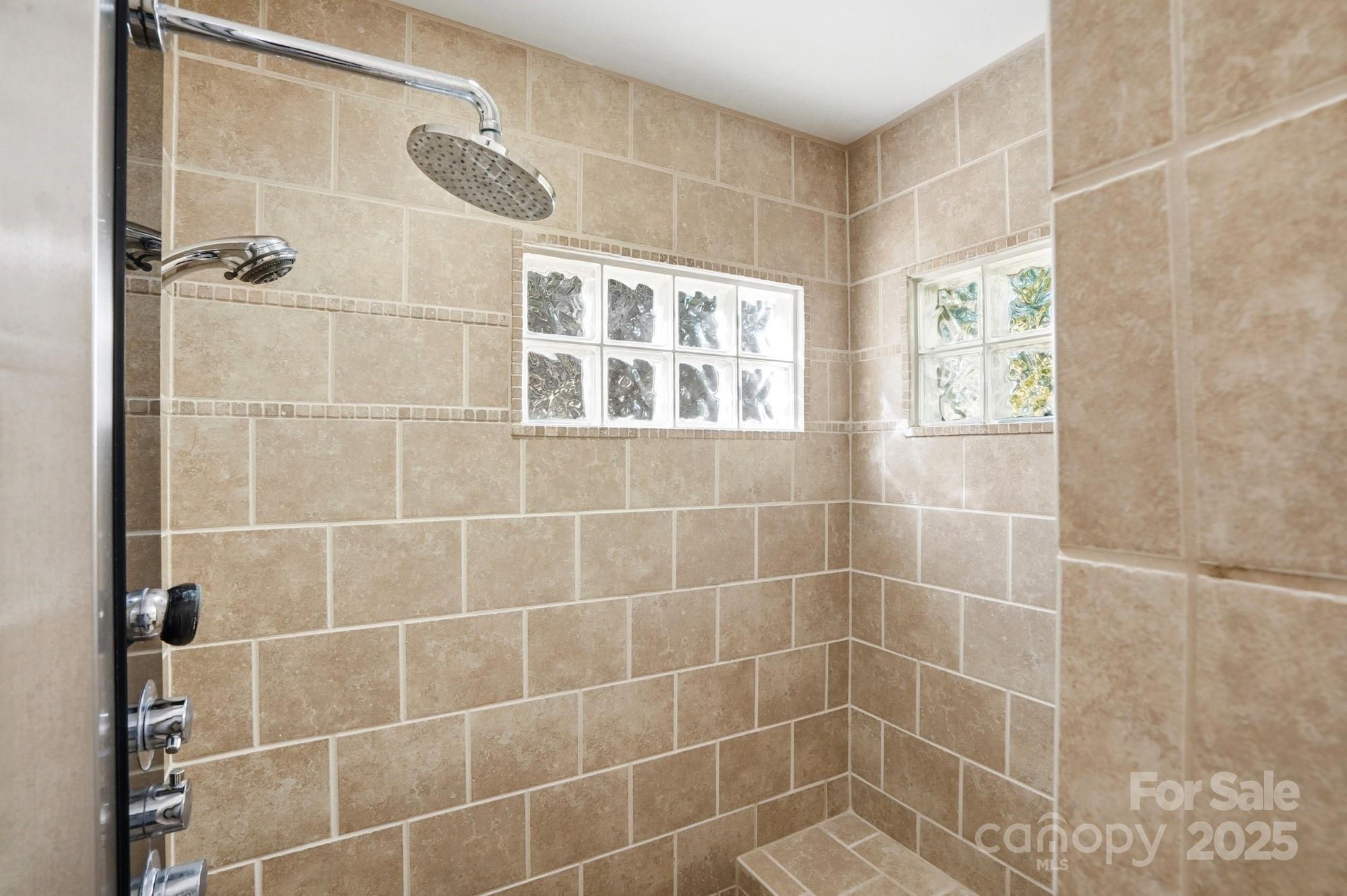 3108 Westmoreland Avenue Charlotte, NC 28205 - Photo 13 of 27 a bathroom with a shower