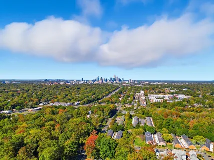 an aerial view of residential building and trees