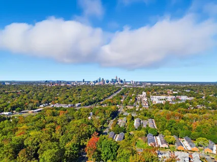 an aerial view of residential building and trees