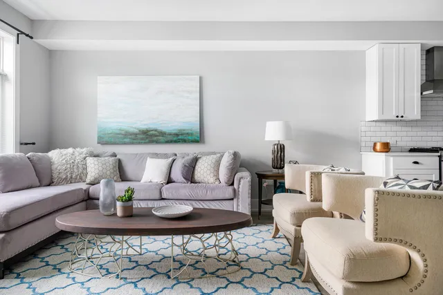 a living room with furniture and a couch