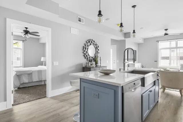 a bathroom with a sink double vanity and a mirror