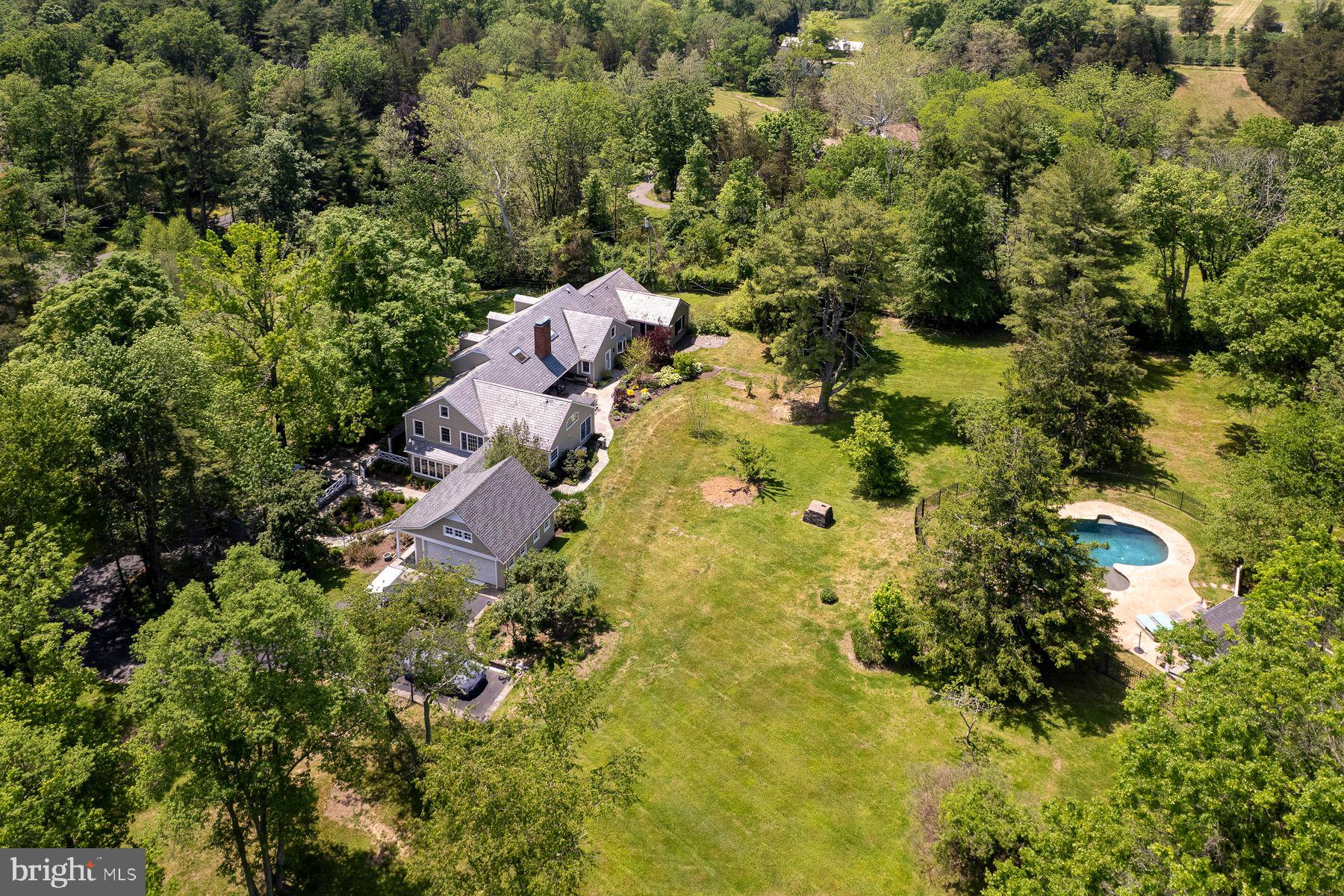821 Pretty Brook Road Princeton, NJ 08540 - Photo 32 of 32 an aerial view of residential house with swimming pool and green space