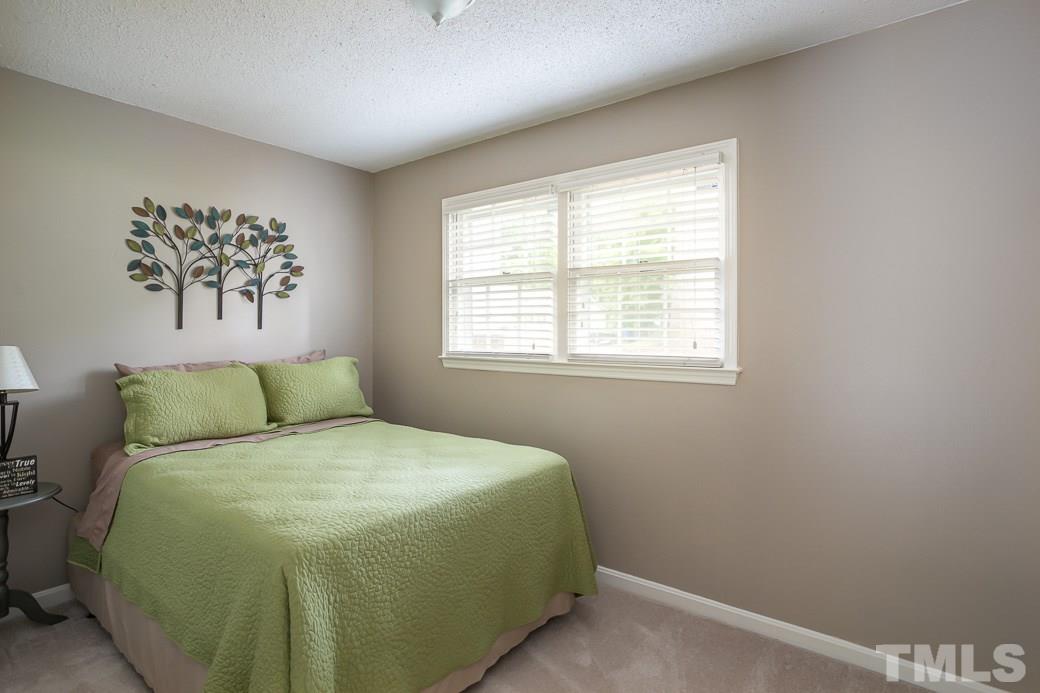 1017 Mockingbird Drive Raleigh, NC 27615 - Photo 6 of 12 The Guest Bedrooms are spacious with ample closet space and neutral paint. Quiet and clean, a perfect place to sleep peacefully and dream. Don’t need another bedroom? Make this an office. There’s plenty of space for your furniture.