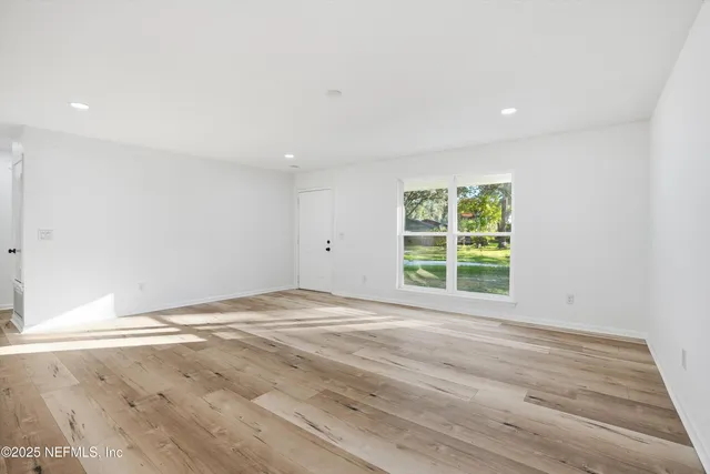 a view of a kitchen with a sink
